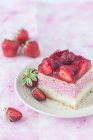A slice of strawberry vanilla cream fridge cake — Stock Photo