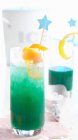 Non-alcoholic 'Blue Ocean' cocktail with passion fruit, grapefruit and curacao — Stock Photo