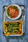 Asparagus and giant couscous with tomatoes — Stock Photo
