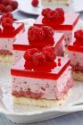 A slice of raspberry cheesecake with raspberry mousse — Stock Photo