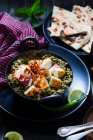 Saag paneer (fried cheese on spinach, India) — Stock Photo