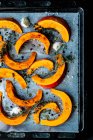 Pumpkin slices with garlic and thyme — Foto stock