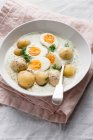 Traditional Czech white dill sauce with boiled potatoes and eggs — Stock Photo