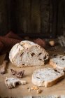 Figs and walnut homemade bread loaf and slices — Stock Photo