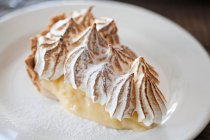 Lemon Meringue Pie on white table — Stock Photo