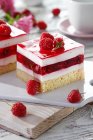 Raspberries cake with vanilla cream and jelly — Stock Photo
