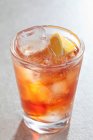 Negroni with ice cubes in the glass — Stock Photo