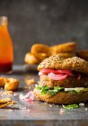 Veggie Vegan Burger made with cauliflower beans and pickled red onions — Stock Photo