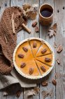 Autumnal pumpkin and pecan pie — Stock Photo