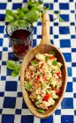 Tabbouleh with tomatoes, cucumbers and mint — Stock Photo