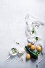 An arrangement of courgette, potatoes, garlic and vegan herb sauce — Stock Photo
