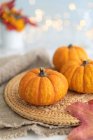 Autumn background with pumpkins and leaves — Stock Photo