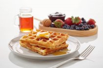 Vanilla flavour Waffles with butter and honey — Stock Photo
