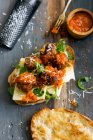 Vegetarian meat substitute meatballs with swiss cheese and a tomato sauce in a sub — Stock Photo
