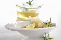 Tuscan-style pickled fennel with vinegar, white wine, onions, garlic, rosemary and pepper — Stock Photo
