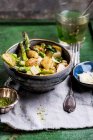 Gnocchi with green asparagus, sage, lime and Parmesan cheese — Stock Photo