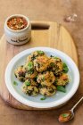 Halloumi and millet vegetarian meatballs, keftedes, red pepper and walnut dip — Stock Photo