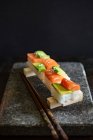 Sushi with salmon and avocado (Japan) - foto de stock