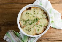French onion soup in white bowl — Stock Photo