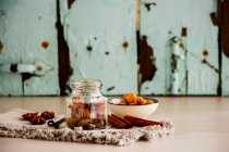 Various spice on a cloth and in a jar — Photo de stock