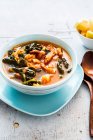Kale soup with chickpeas and pancetta — Stock Photo
