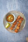 Tempeh Skewers Satay dip with Sesame and onion seeds — Stock Photo