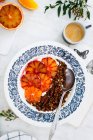 Espresso and chocolate granola bowl with yoghurt and blood oranges — Stock Photo