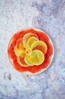 Fruit carpaccio with citrus fruits — Stock Photo