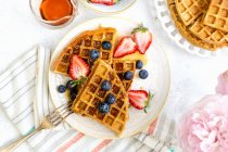 Healthy breakfast waffles with fresh berries — Stock Photo