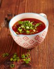 Sweet and sour fondue sauce with spring onions, ketchup, vinegar and ginger — Stock Photo