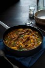Sausage casserole cooked in cider with lentils apples and tarragon — Stock Photo