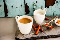 Traditional indian masala chai tea in white cup — Stock Photo