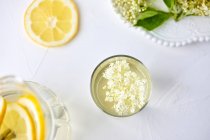 Homemade elderflower juice in a glass — Stock Photo