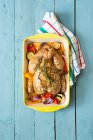 Summery roast chicken with vegetables and rosemary (Italy) — Stock Photo