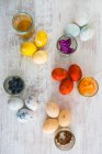 Ingredients and eggs with egg, on wooden background — Stock Photo