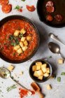 Tomato soup with chorizo and fried croutons — Stock Photo
