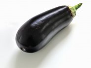 An eggplant on a white background — Stock Photo