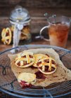 Close-up shot of delicious Lattice cookies on greaseproof paper — Stock Photo