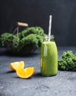 Vegan kale and orange smoothies — Stock Photo