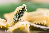 Close-up shot of delicious Ravioli with herb filling — Stock Photo