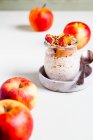 Baked apple overnight oats with nut brittle — Stock Photo