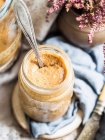 Natural organic hazelnut butter in a jar — Stock Photo