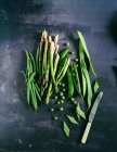 Green beans asparagus peas and flat beans taccole — Foto stock