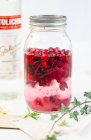 Jar of red currant jam in glass jars on white background — Stock Photo