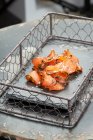 Smoked salmon in a grill basket — Foto stock