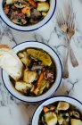 Beef stew with leek, potatoes, carrots, shallots and thyme — Stock Photo