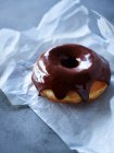 Close-up shot of delicious Chocolate glazed donut — Stock Photo
