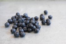 View of fresh blueberries on concrete surface — Stock Photo