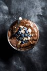Cocoa Mousse dessert with fresh blueberries and nuts — Stock Photo