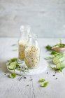 Peeled hemp in glass bottles — Stock Photo